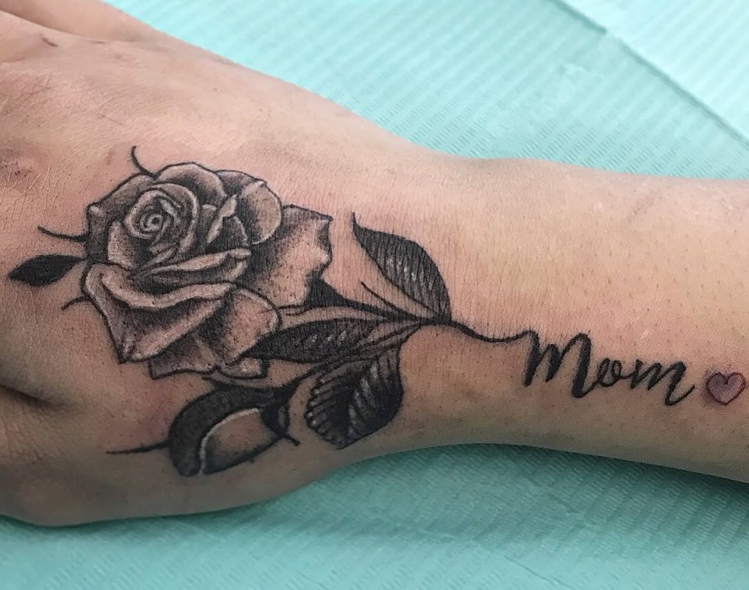 27 Rose Hand Tattoo Ideas: From Classic Black-and-Gray to Bold Narrative Pieces