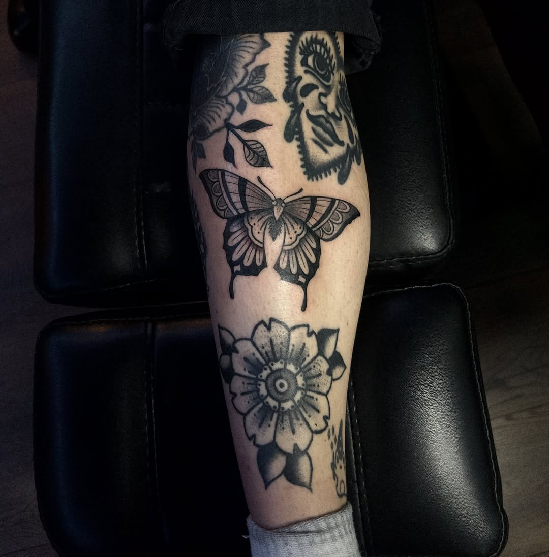 29 Filler Tattoo Ideas: Smart Ways to Close Gaps in Your Sleeve with Flowers, Snakes and Symbols