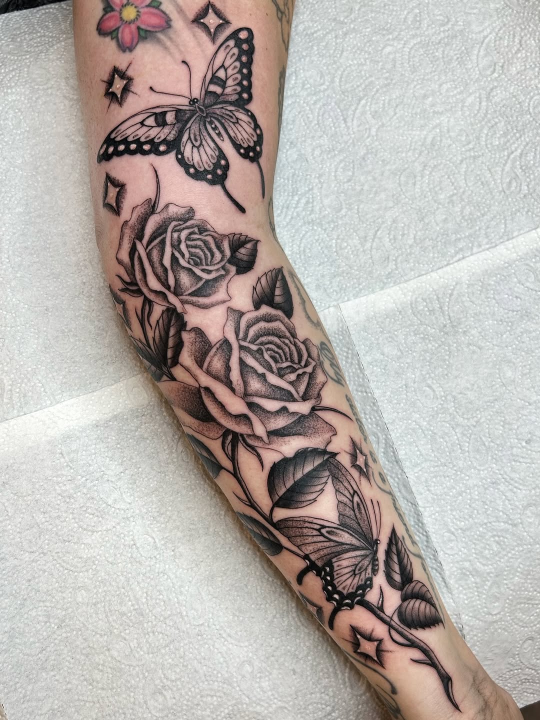 29 Filler Tattoo Ideas: Smart Ways to Close Gaps in Your Sleeve with Flowers, Snakes and Symbols