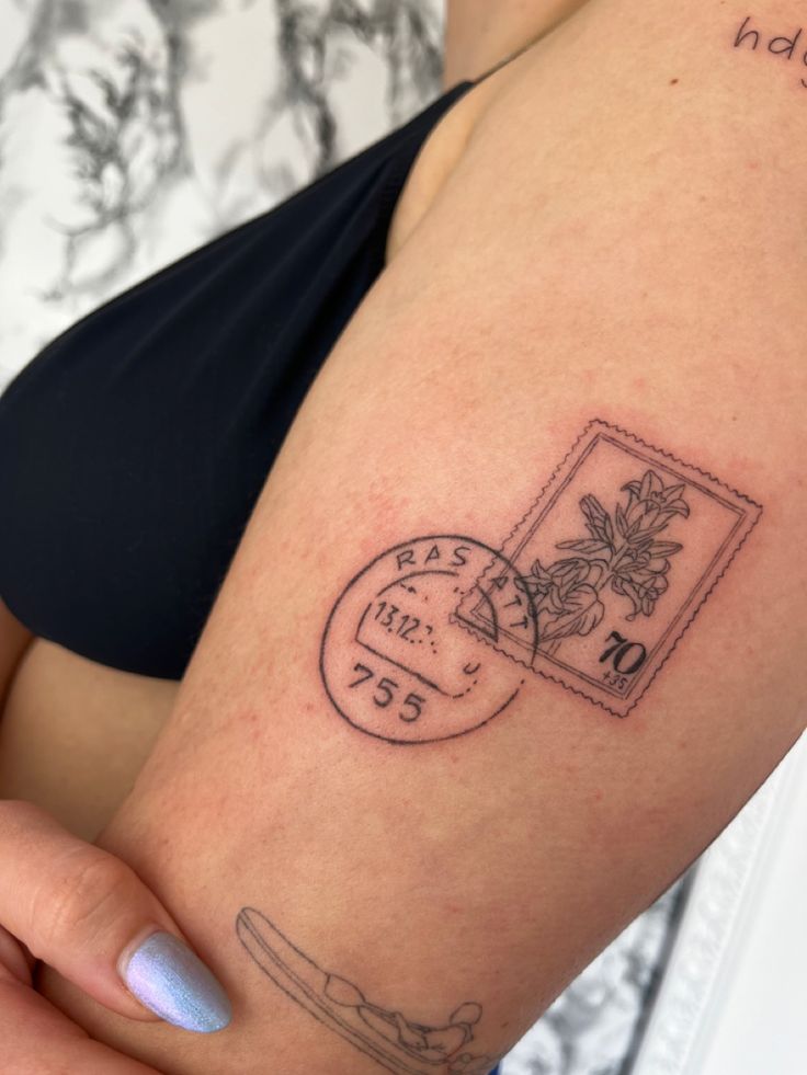 30 Unique Stamp Tattoo Ideas with Travel, Floral, Vintage, Fine Line, and Matching Postage Designs