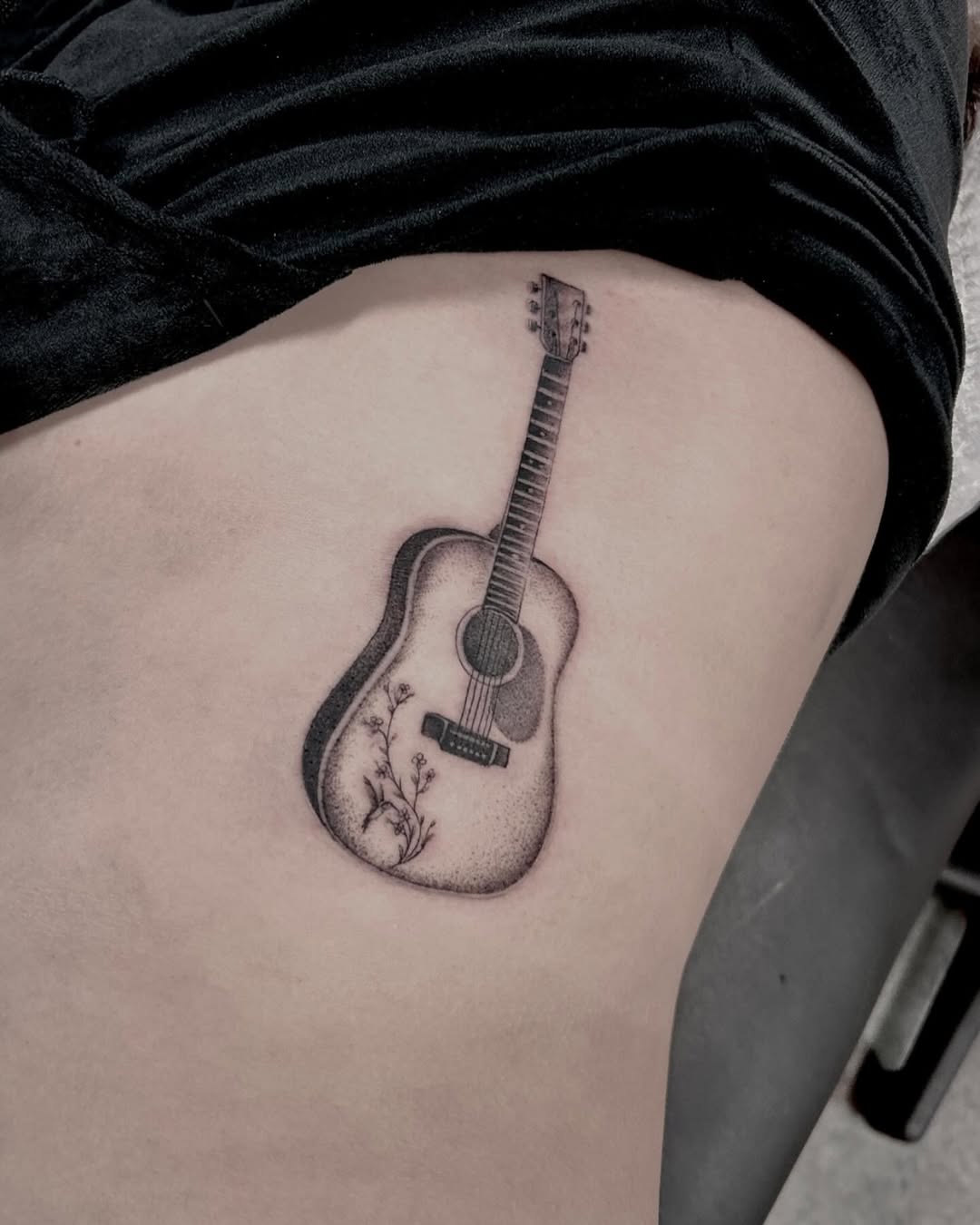 31 Guitar Tattoo Ideas for Music Lovers: From Minimalist Designs to Bold Sleeve Art