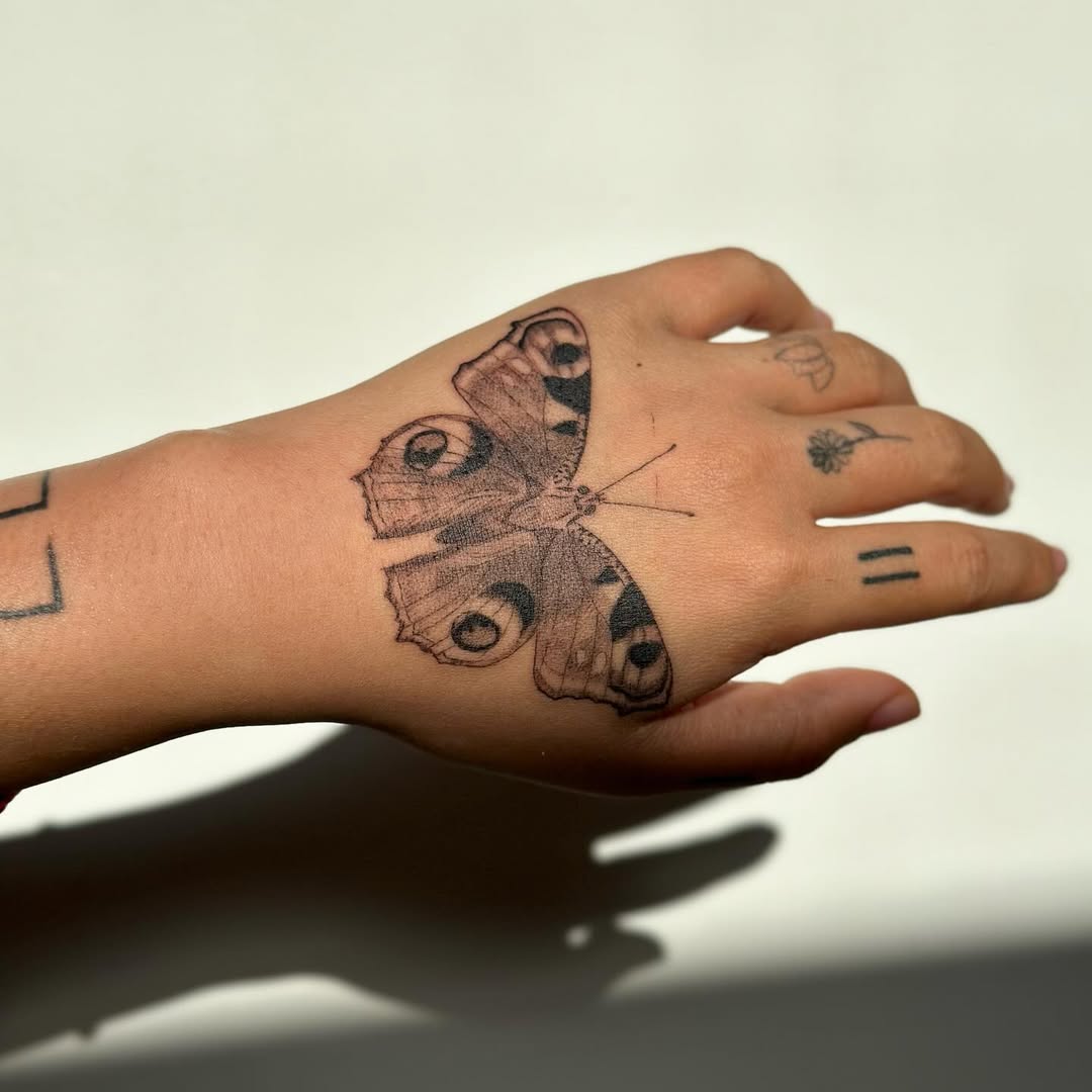 29 Butterfly Hand Tattoo Ideas Full of Meaning and Style