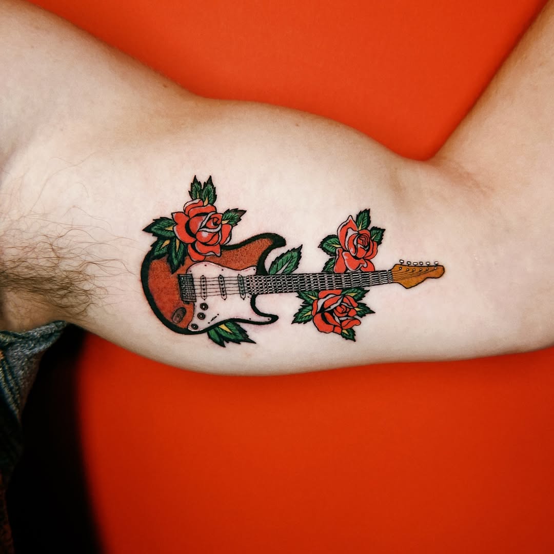 31 Guitar Tattoo Ideas for Music Lovers: From Minimalist Designs to Bold Sleeve Art