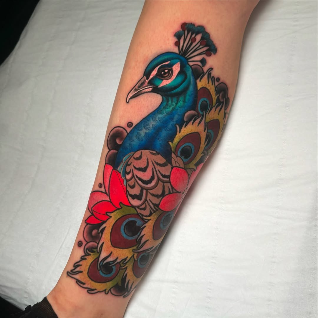 The Symbolic Splendor of Peacock Tattoos: Powerful Designs That Speak for Themselves