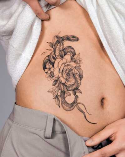 13 Snake Tattoo Ribs Ideas for Striking Art
