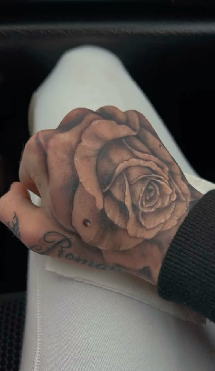 27 Rose Hand Tattoo Ideas: From Classic Black-and-Gray to Bold Narrative Pieces