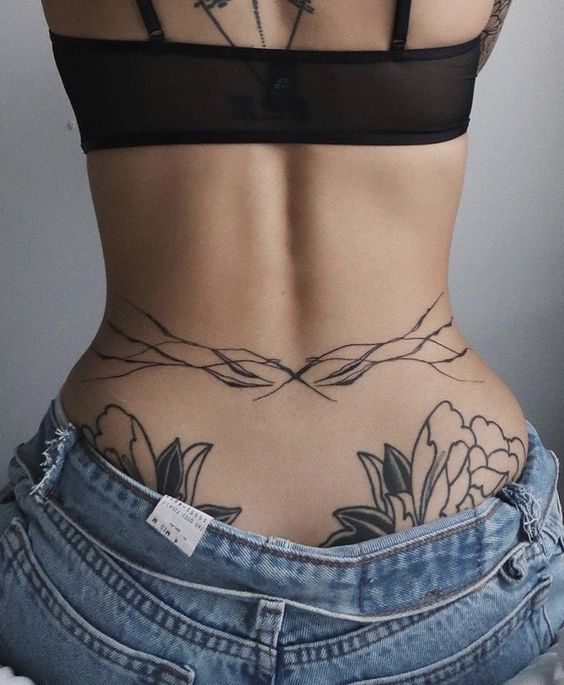 18 Stunning Lower Back Tattoo Ideas for Women & Men: Classy & Artistic Inspiration