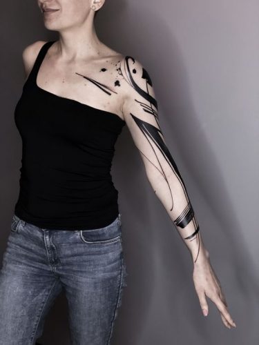 Explore 20 Striking Abstract Line Tattoo Designs for  &#8211; Get Inspired Today!
