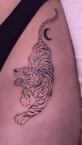 25 Tiger Tattoo on Thigh Ideas