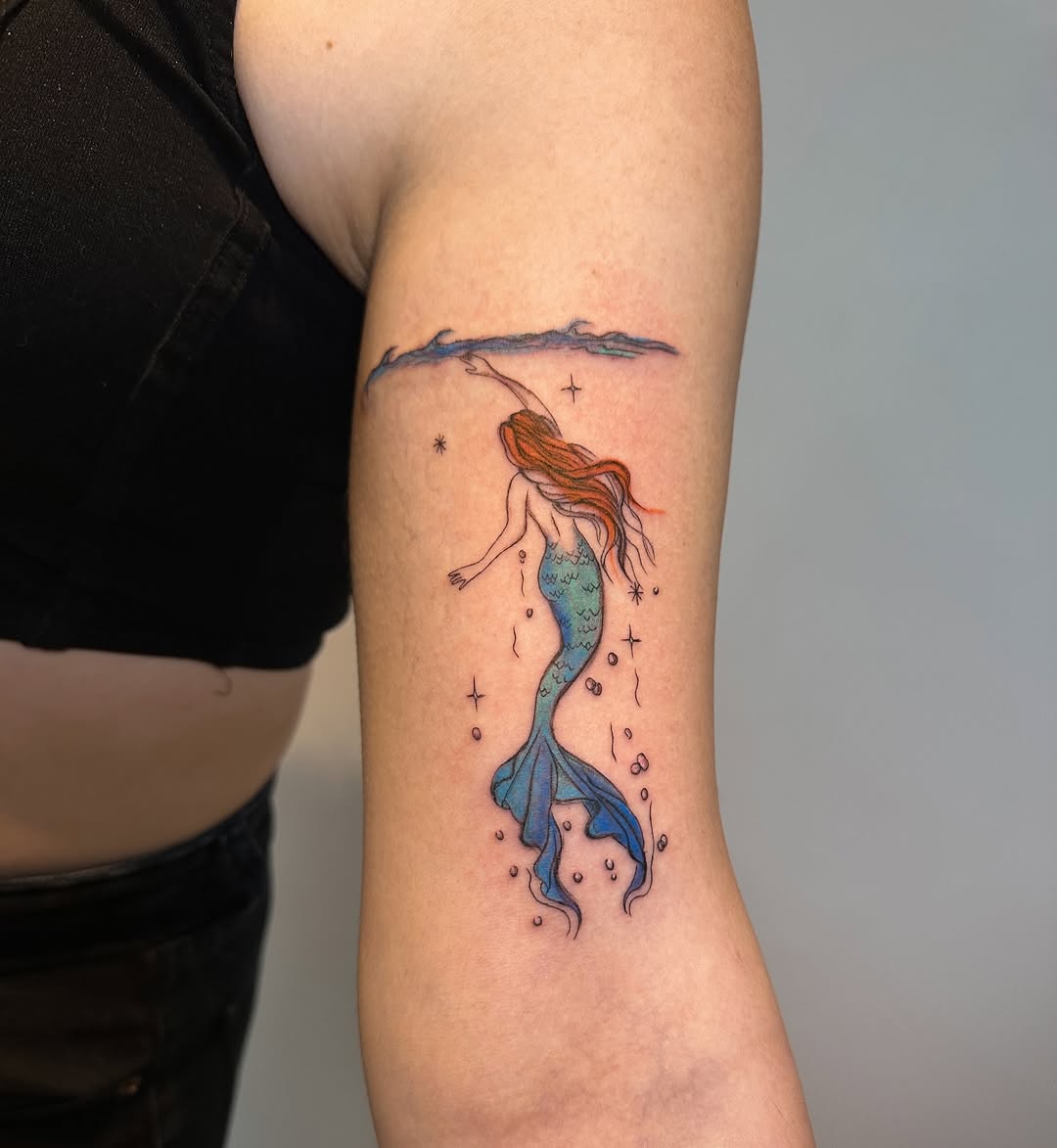 27 Mermaid Tattoo Ideas With Minimalist, Traditional, Afro, Siren, and Barbie-Inspired Designs