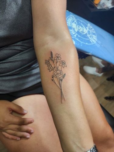 Discover the Charm of February Birth Flower Tattoos: Violets & Primroses Ink Ideas