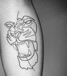 27 Minimalist Lion Tattoo: Subtle Elegance and Symbolism
