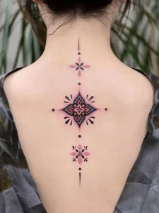 27 Delicate Spine Tattoo Ideas for Women