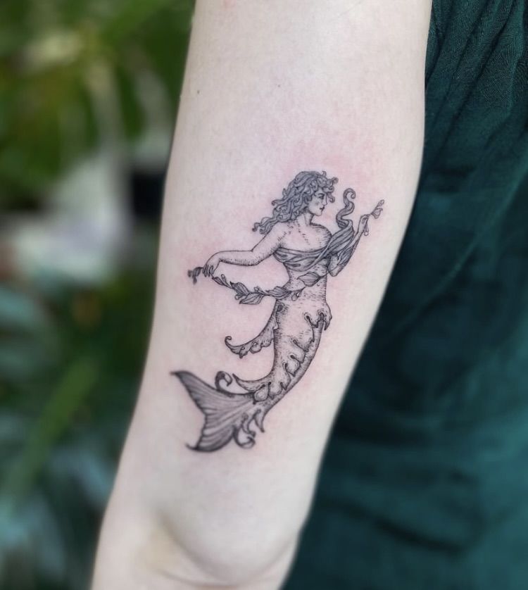 27 Mermaid Tattoo Ideas With Minimalist, Traditional, Afro, Siren, and Barbie-Inspired Designs