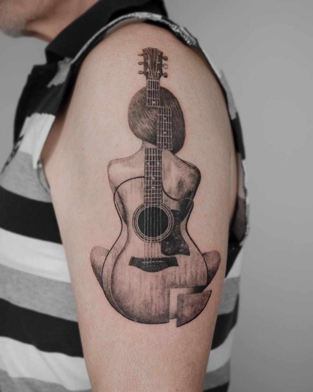 31 Guitar Tattoo Ideas for Music Lovers: From Minimalist Designs to Bold Sleeve Art