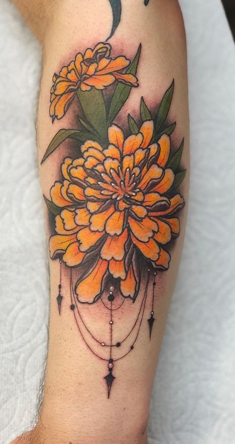 26 Marigold Tattoo Ideas for Every Style Fineline, Realistic, Black and White, Traditional, and Color Designs