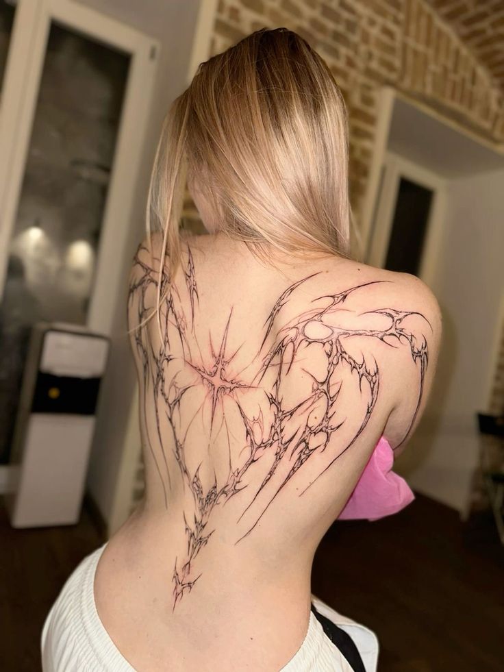 Wings Tattoo 28 Ideas: Stunning Angel, Phoenix, Icarus, Back, Arm & Chest Designs