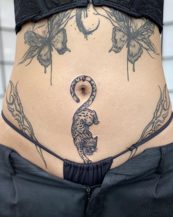 22 Ideas for Lower Stomach Tattoos: Stunning Designs and Unique Personal Statements