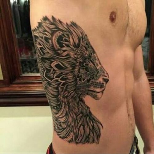 Expressive and Bold: 18 Lion Tattoo on Ribs