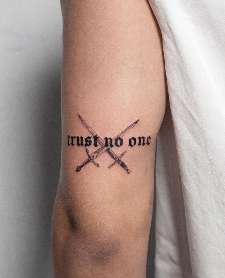 25 Trust No One Tattoo Designs with Lettering, Fonts, Ideas for Men and Women