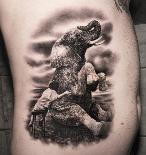 19 Elephant Tattoos with Raised Trunk Ideas