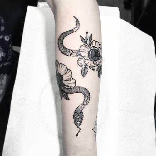 20 Snake Tattoos on Arm for a Bold Statement