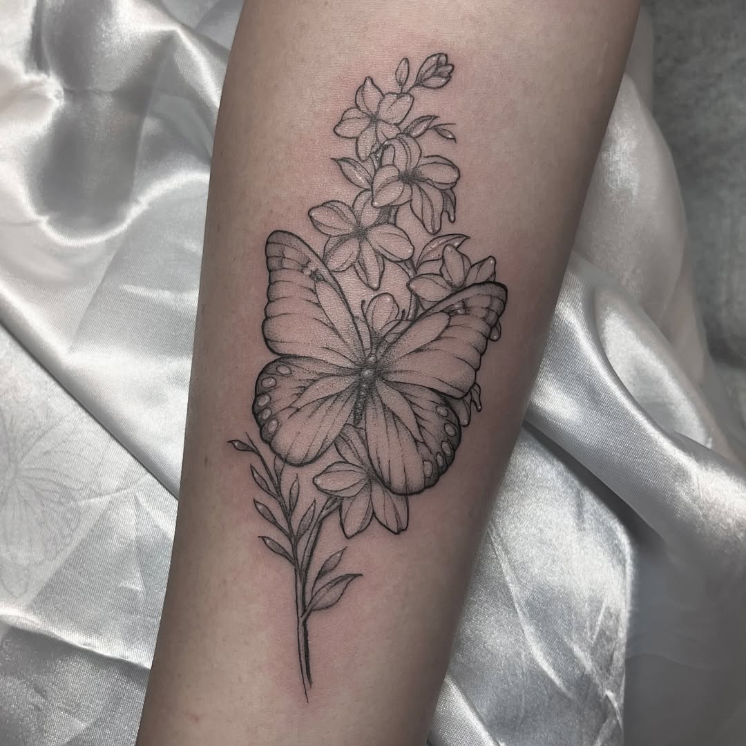 28 Larkspur Tattoo Ideas: Delicate July Blooms with Big Meaning