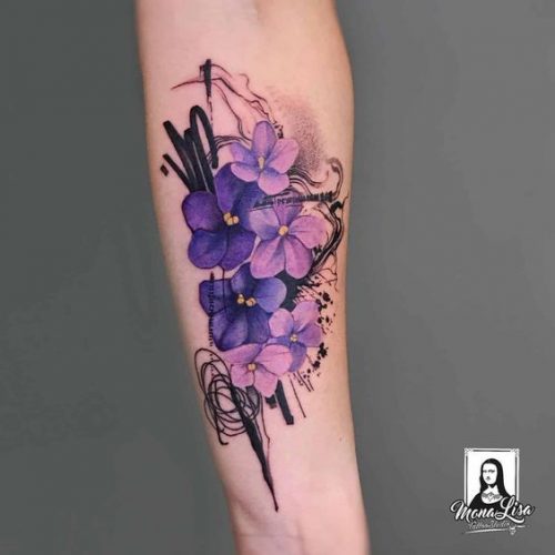Discover the Charm of February Birth Flower Tattoos: Violets & Primroses Ink Ideas