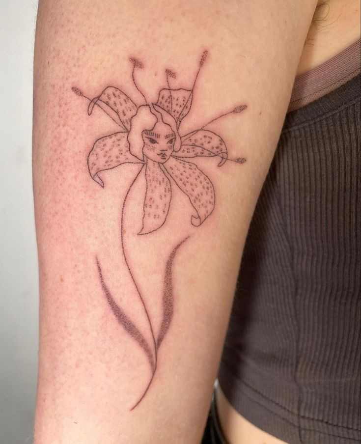 26 Orchid Tattoo Ideas for Minimalist, Colour, and Fine Line Designs