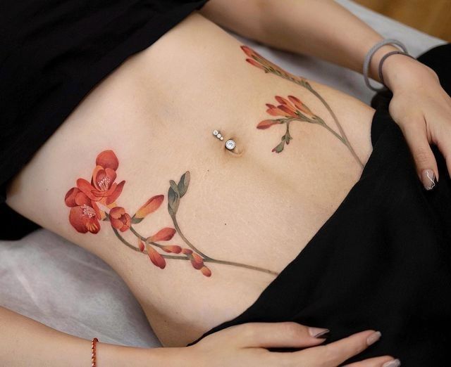 22 Ideas for Lower Stomach Tattoos: Stunning Designs and Unique Personal Statements