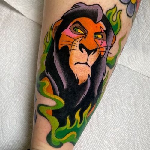 Embrace the Majesty: 24 Lion King Tattoo Designs