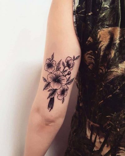 Discover the Charm of February Birth Flower Tattoos: Violets & Primroses Ink Ideas