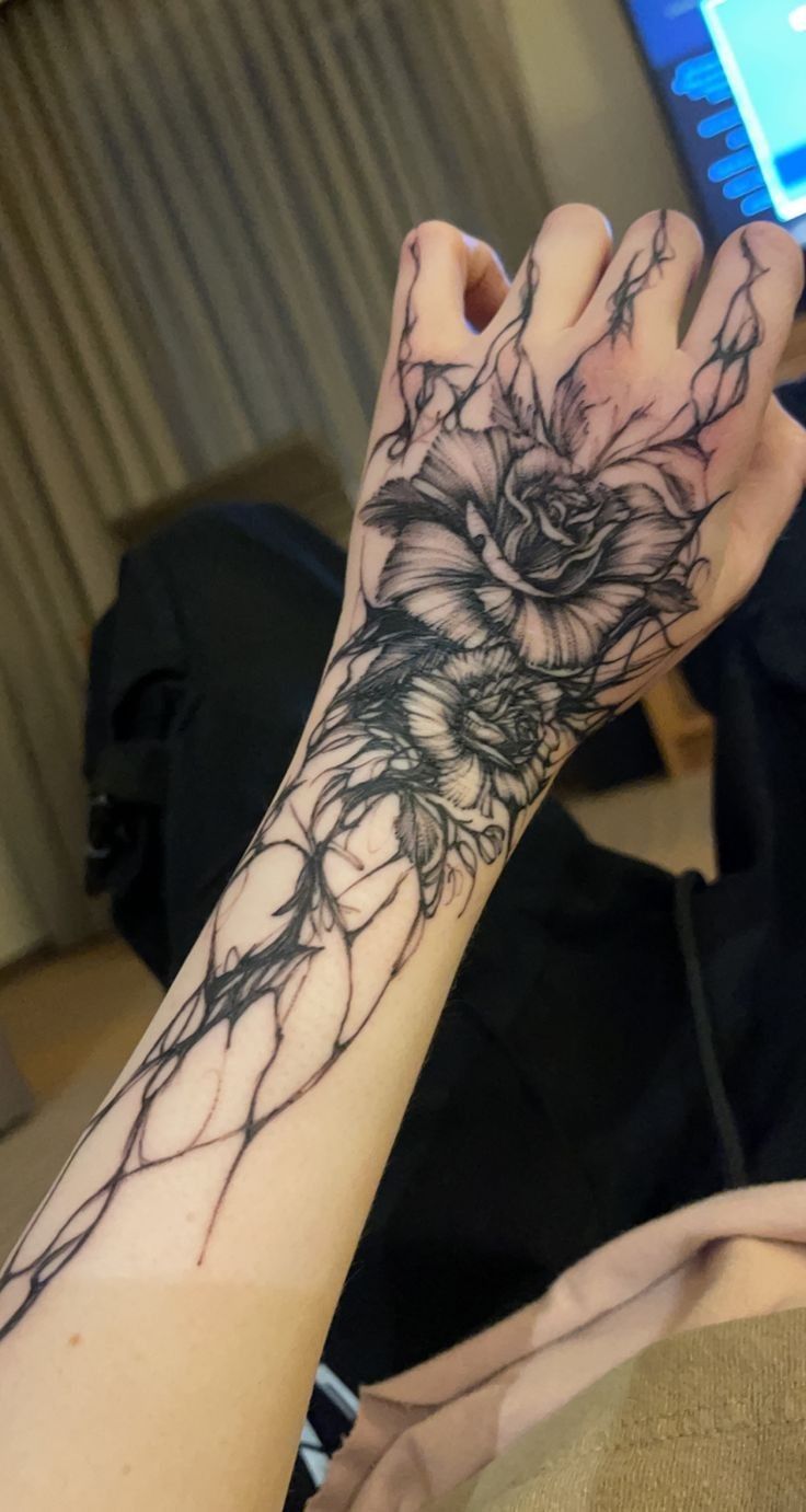 27 Rose Hand Tattoo Ideas: From Classic Black-and-Gray to Bold Narrative Pieces