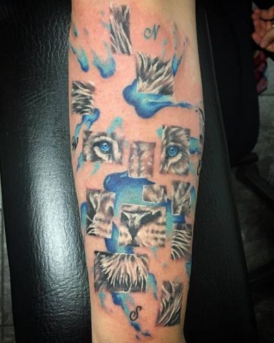 Lion Tattoo with Blue Eyes: 20 Enchanting and Mesmerizing Designs