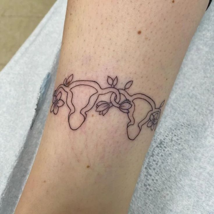 29 Womb Tattoo Ideas for : Floral, Anime, Goth, Succubus, and Symbolic Designs