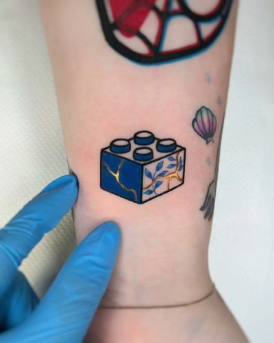 Explore Top 20 Lego-Inspired Tattoos: Creative & Nostalgic Designs for