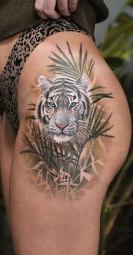 25 Tiger Tattoo on Thigh Ideas