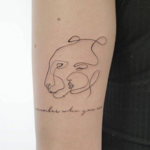 27 Minimalist Lion Tattoo: Subtle Elegance and Symbolism