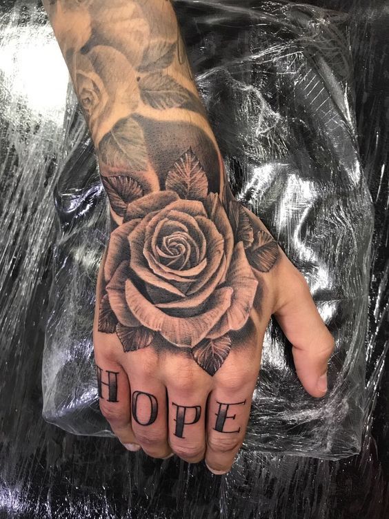 27 Rose Hand Tattoo Ideas: From Classic Black-and-Gray to Bold Narrative Pieces