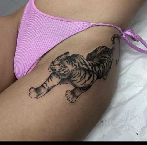 25 Tiger Tattoo on Thigh Ideas