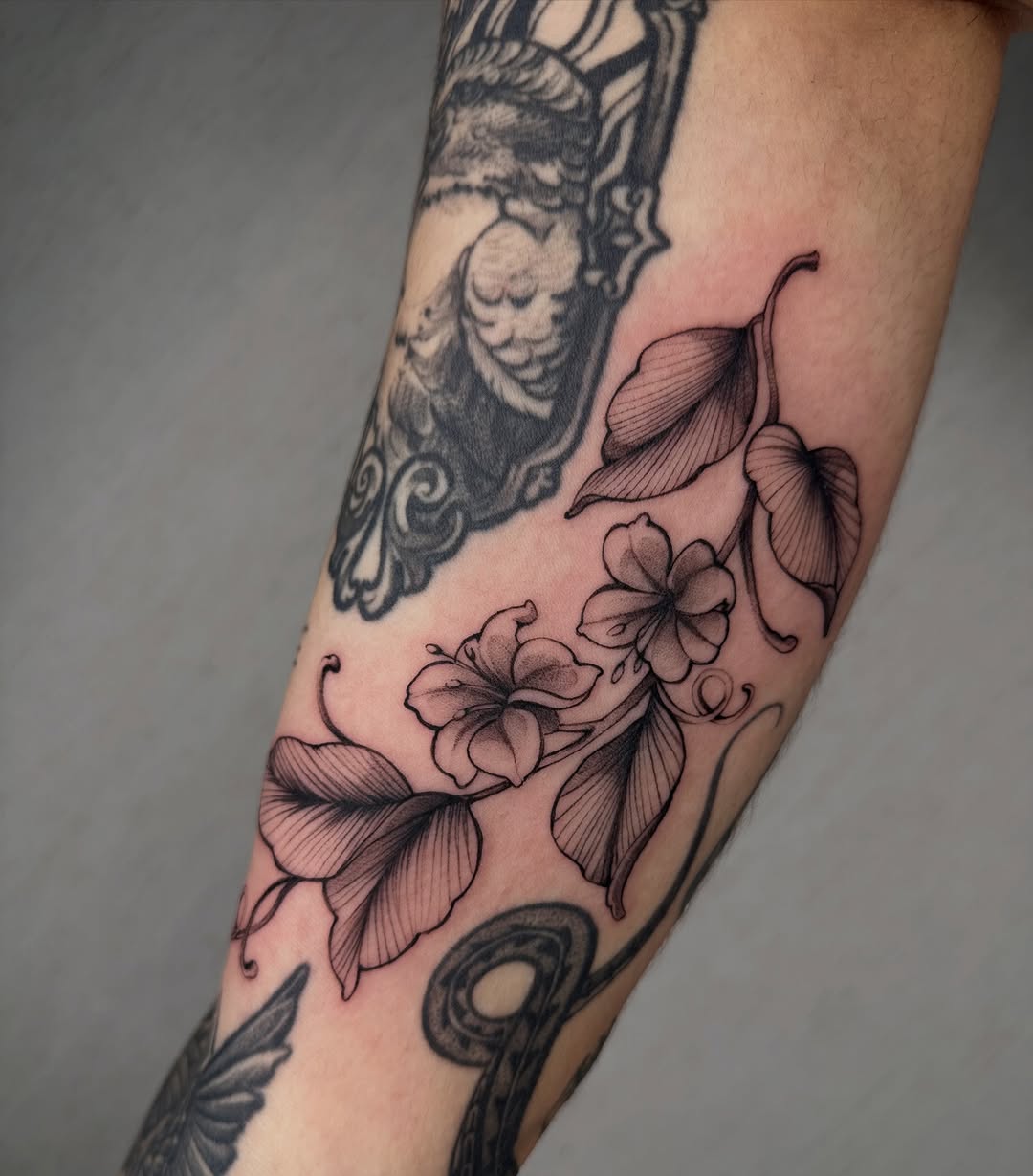 29 Filler Tattoo Ideas: Smart Ways to Close Gaps in Your Sleeve with Flowers, Snakes and Symbols