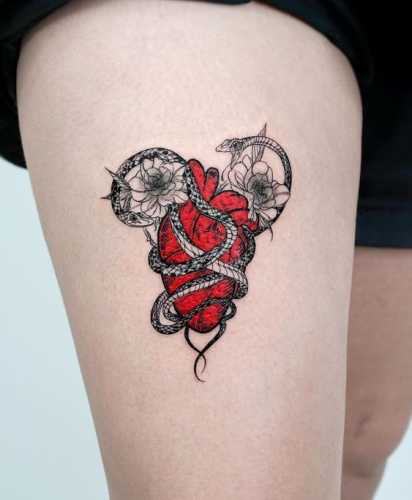 23 Snake Tattoos on Thigh Ideas for Alluring Art