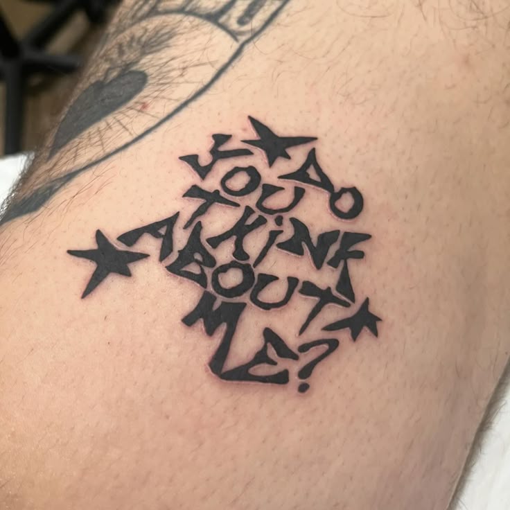 26 Lettering Tattoo Ideas for Men: Bold Fonts, Chicano, Japanese, Vertical, Fine Line & More