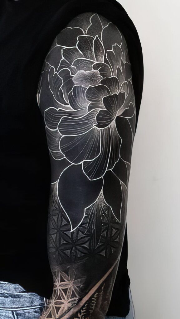 Discover Bold Blackout Tattoo Ideas : Full Sleeve, Geometric, Abstract, with White Ink
