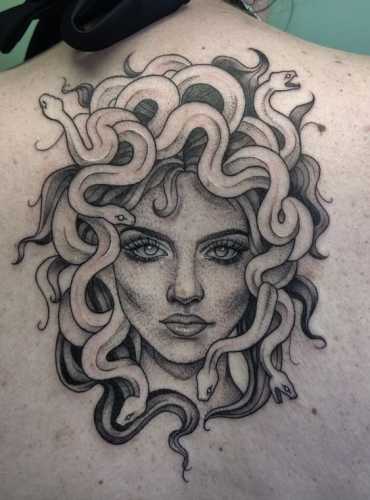 19 Snake Tattoos on Back Ideas for a Striking Look