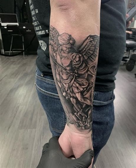 29 Powerful St Michael Tattoo Designs for Men and Women   Forearm, Sleeve, Geometric, Traditional