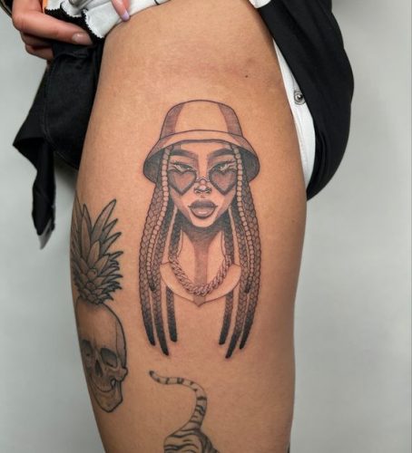 Explore Top 18 Afro Tattoo Designs of : Cultural Heritage Meets Modern Artistry