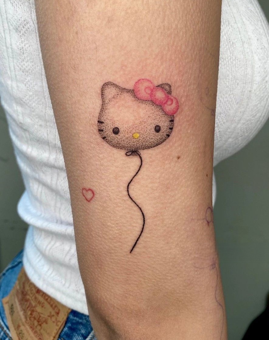 Hello Kitty Tattoo 29 Ideas for Women, Men & Couples Sleeve, Fine Line, Y2K, Cien Pies & More