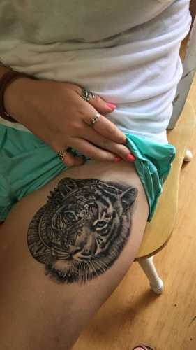 25 Tiger Tattoo on Thigh Ideas