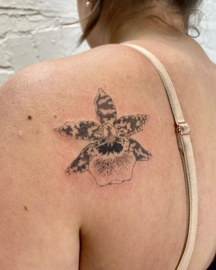 26 Orchid Tattoo Ideas for Minimalist, Colour, and Fine Line Designs